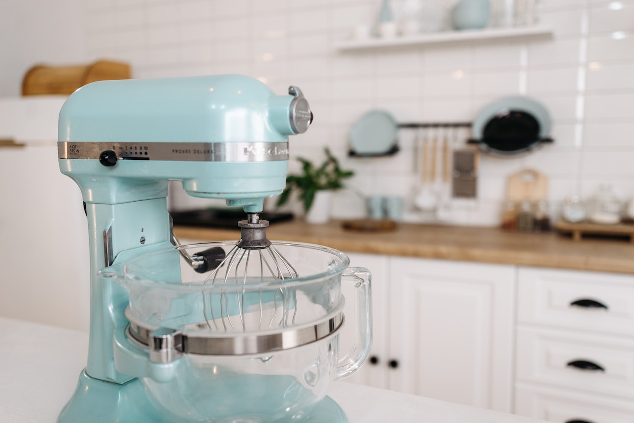 blue stand mixer in kitchen